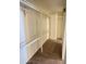 Walk-in closet with metal shelving and carpeted floor at 8840 E Sunland Ave # 142, Mesa, AZ 85208