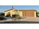 Charming single-story home with a well-manicured front yard and an attached two-car garage at 8840 E Sunland Ave # 142, Mesa, AZ 85208