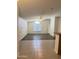 Bright living room with tile and wood flooring and a ceiling fan at 8840 E Sunland Ave # 142, Mesa, AZ 85208