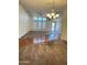 Bright living room with large windows and hardwood flooring at 8840 E Sunland Ave # 142, Mesa, AZ 85208