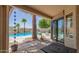 Inviting outdoor patio and backyard featuring a private pool area at 10794 S Coolwater Dr, Goodyear, AZ 85338