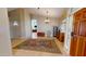 Spacious foyer with tile flooring and decorative rug at 10794 S Coolwater Dr, Goodyear, AZ 85338