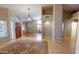 Welcoming foyer with hardwood floors and lots of natural light at 10794 S Coolwater Dr, Goodyear, AZ 85338