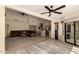 Spacious living room connects seamlessly to the kitchen and outdoor area at 10794 S Coolwater Dr, Goodyear, AZ 85338