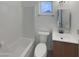 Bathroom with shower and tub combination with natural light and an updated vanity at 1105 W Anderson Dr, Phoenix, AZ 85023