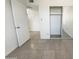 Bedroom featuring tile floors and a closet at 1105 W Anderson Dr, Phoenix, AZ 85023