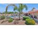 Landscaped backyard with a sparkling pool, lounge chairs and an outdoor kitchen area for entertaining guests at 12682 N 80Th Pl, Scottsdale, AZ 85260