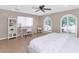 Bright bedroom with large window, desk, and natural light for a serene atmosphere at 12682 N 80Th Pl, Scottsdale, AZ 85260