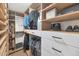 Organized walk-in closet with custom shelving, drawers, and hanging racks at 12682 N 80Th Pl, Scottsdale, AZ 85260