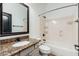 Bathroom features a single sink with granite counters and a shower and tub combination at 13034 W Krall Ct, Glendale, AZ 85307