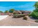 Charming single story home features a desert landscaped front yard with a gravel driveway at 13034 W Krall Ct, Glendale, AZ 85307