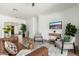 Comfortable living room featuring a brown sofa, gray chairs, and stylish decor at 13034 W Krall Ct, Glendale, AZ 85307