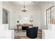 Stylish office showcasing clean design, wood floors, and natural light at 13034 W Krall Ct, Glendale, AZ 85307