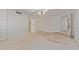 Bedroom features neutral carpet, white walls, built in storage, and ceiling fan with lighting at 132 W Wood Dr, Phoenix, AZ 85029