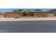 Charming single-story brick home featuring desert landscaping, a front patio, and an attached two-car garage at 132 W Wood Dr, Phoenix, AZ 85029