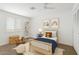 A styled bedroom with a twin bed and decor at 1417 W Los Arboles Pl, Chandler, AZ 85224