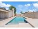 Beautiful backyard pool with mature shade tree at 1417 W Los Arboles Pl, Chandler, AZ 85224