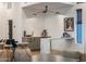 Elegant bar area with marble countertops, a sink, and a modern light fixture at 14518 N 99Th St, Scottsdale, AZ 85260