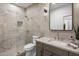 Well-lit bathroom with walk-in glass shower and marble countertop at 14518 N 99Th St, Scottsdale, AZ 85260