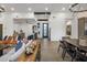 Spacious living room with modern furnishings, a stylish bar area, and an open layout at 14518 N 99Th St, Scottsdale, AZ 85260
