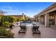 Private pool area with two chaise lounges surrounded by lush landscaping at 14518 N 99Th St, Scottsdale, AZ 85260