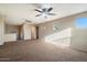Upstairs Bonus Room featuring plush carpeting and multiple windows for natural light at 15844 W Lisbon Ln, Surprise, AZ 85379