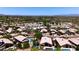 Expansive aerial view showing rooftops, desert landscaping, neighborhood streets, and mountain views at 17201 E Hillcrest Dr, Fountain Hills, AZ 85268