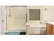 Bathroom featuring a separate shower and soaking tub at 17201 E Hillcrest Dr, Fountain Hills, AZ 85268