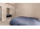 This bedroom has carpeted floors and mirrored closet doors at 17201 E Hillcrest Dr, Fountain Hills, AZ 85268