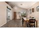 Neutral dining area featuring hardwood floors, decor, and natural light at 17201 E Hillcrest Dr, Fountain Hills, AZ 85268