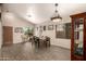 Bright dining room showcasing hardwood floors and decor, with plenty of natural light at 17201 E Hillcrest Dr, Fountain Hills, AZ 85268