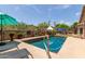Inviting pool area with lounge chairs and desert landscaping in backyard at 17201 E Hillcrest Dr, Fountain Hills, AZ 85268