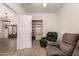 Comfortable sitting room with built-in bookshelves and plush seating at 17201 E Hillcrest Dr, Fountain Hills, AZ 85268