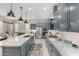 Modern kitchen featuring granite countertops, stainless steel appliances, and ample cabinet space at 17721 W Sandalwood Dr, Goodyear, AZ 85338