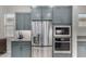 Kitchen with granite countertops, stainless steel appliances, and plenty of cabinet storage space at 17721 W Sandalwood Dr, Goodyear, AZ 85338