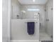 Tiled glass shower featuring modern fixtures and hardware at 17721 W Sandalwood Dr, Goodyear, AZ 85338
