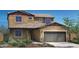 Charming two-story home featuring a desert landscape and a two-car garage at 19015 W Rose Ln, Waddell, AZ 85355
