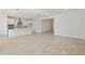 Open living area featuring tile floors, recessed lighting and access to the kitchen at 19015 W Rose Ln, Waddell, AZ 85355