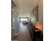 Hallway leading to open concept living space at 19929 W Marshall Ave, Litchfield Park, AZ 85340
