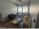 Cozy playroom featuring a small sofa, play table set, and a slide for hours of active entertainment at 19929 W Marshall Ave, Litchfield Park, AZ 85340