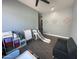 The playroom is well-equipped with toys, a slide, an easel, and soft seating for creative play and relaxation at 19929 W Marshall Ave, Litchfield Park, AZ 85340