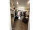 Large walk-in closet with custom shelving and ample storage for clothing and accessories at 19929 W Marshall Ave, Litchfield Park, AZ 85340