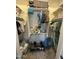 Well-organized walk-in closet with shelves, hanging clothes, toys, and storage solutions at 19929 W Marshall Ave, Litchfield Park, AZ 85340