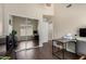 Bedroom area with a workstation, a mirror, wood floors, and neutral paint at 20044 N 30Th Pl, Phoenix, AZ 85050