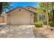 Charming single-story home featuring a two-car garage and low maintenance landscaping at 20044 N 30Th Pl, Phoenix, AZ 85050