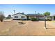 Charming single-Gathering home featuring a well-maintained lawn and a welcoming front porch, perfect for relaxed living at 2204 E Birchwood Ave, Mesa, AZ 85204