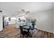 Bright, remodeled kitchen with white cabinets, center island and access to the backyard at 2204 E Birchwood Ave, Mesa, AZ 85204