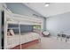 Charming bedroom featuring a bunk bed, soft blue walls, and playful decorations at 2258 N Gentry --, Mesa, AZ 85213