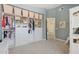 Spacious walk-in closet offering ample storage with custom shelving and organization solutions at 2258 N Gentry --, Mesa, AZ 85213