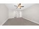 Cozy bedroom with carpet, neutral walls, and a ceiling fan for added comfort at 22706 N 17Th St, Phoenix, AZ 85024